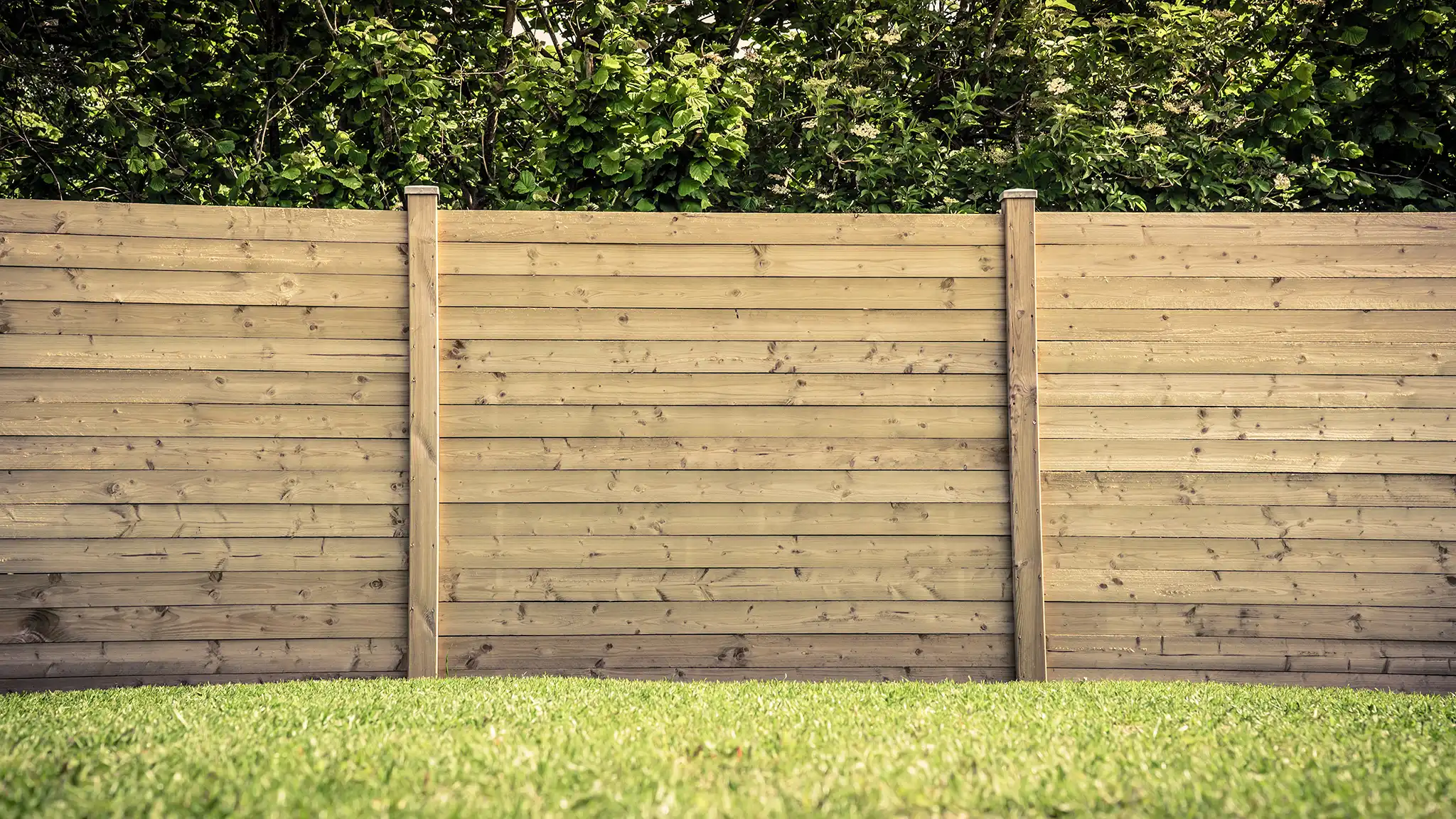 A Chowns Agricultural Services An image of a wooden fence in a farming yard.