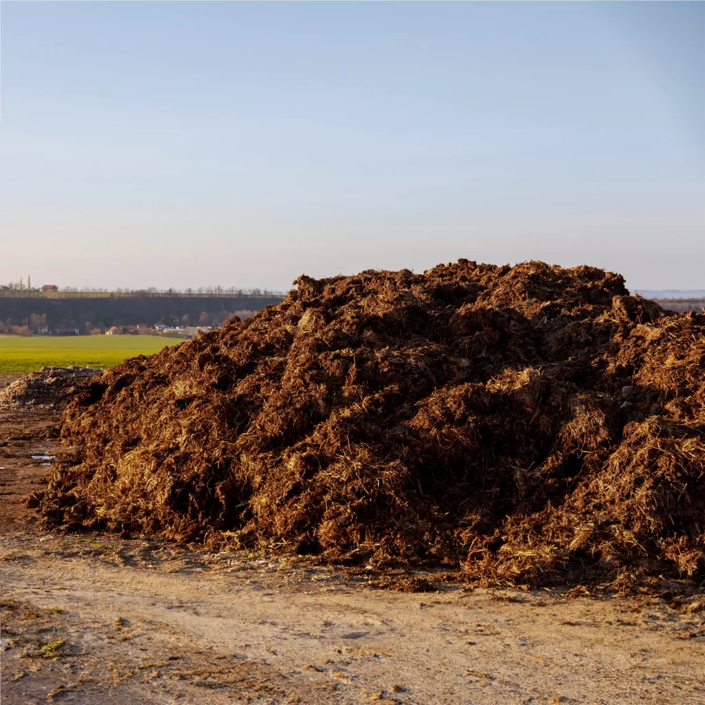 A Chowns Agricultural Services A pile of dirt on a dirt road in Warwickshire.