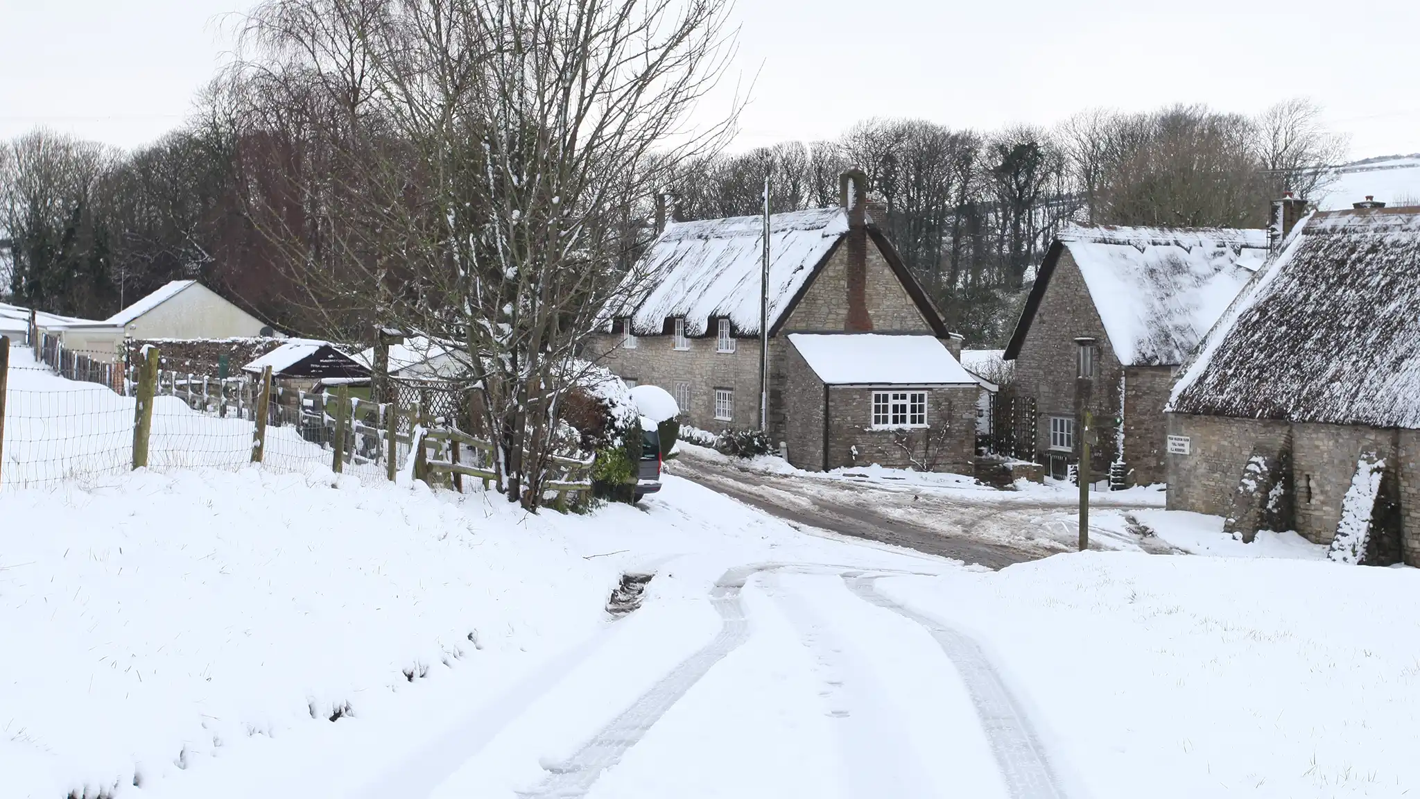 A Chowns Agricultural Services A snow covered road leads to a small village nestled in Worcestershire.